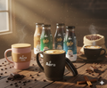 Aera Café Hamper – 2 Mugs + Mixed Coffee Pack (6 Bottles)